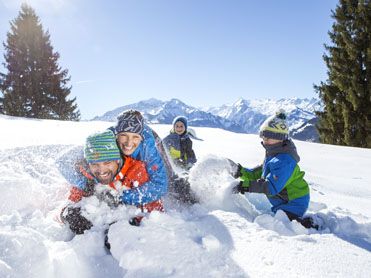 Familie in sneeuw