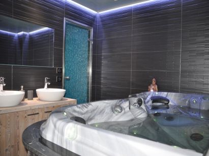 Chalet le Mas des Neiges met whirlpool en hammam-2