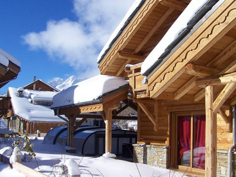 Chalet Le Loup Lodge met privé zwembad en sauna