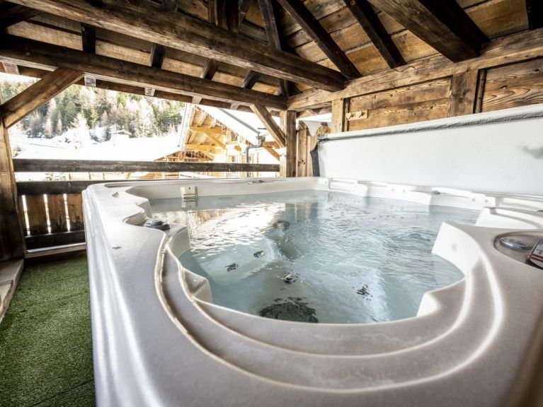 Chalet du Cocoon Pierra Menta 2 met sauna en gedeelde buiten-whirlpool