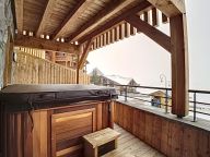 Chalet-appartement Chalet 2000 met buiten whirlpool-3