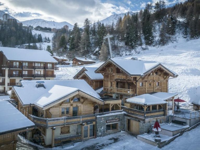 Chalet du Cocoon Pierra Menta 2 met sauna en gedeelde buiten-whirlpool